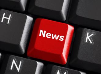 A red key on a standard computer keyboard, with the word NEWS