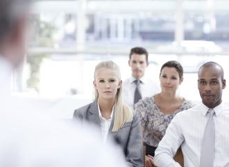 Business People watching a Presentation