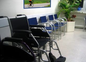 Doctors Medical Centre waiting area, with a wheelchair in seating area